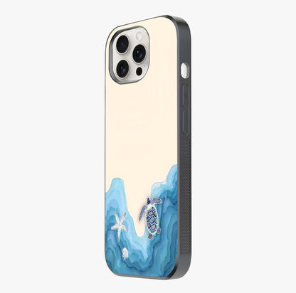 Ocean Drift Turtle Glass Case photographed in natural light showing reflective finish and design depth.