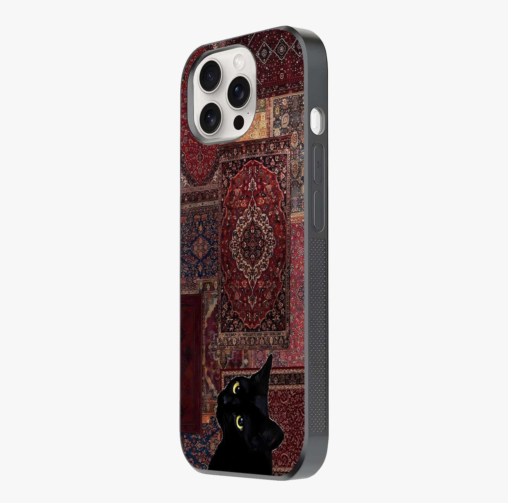 Regal Magic Cat Apple Glass Case photographed in natural light showing reflective finish and design depth.