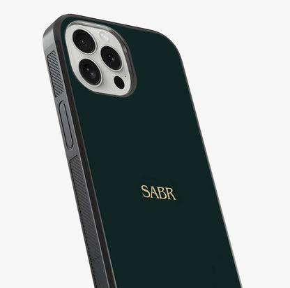 Sabr Minimal Patience Glass Case captured at a warm angle highlighting gloss, texture and premium glass finish.