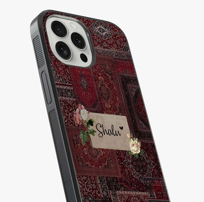 Velvet Wine Pattern Custom Name Glass Case captured at a warm angle highlighting gloss, texture and premium glass finish.