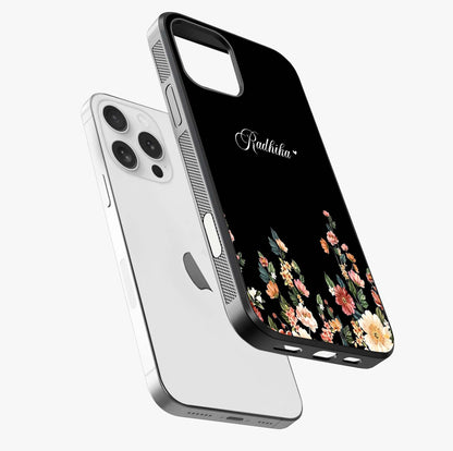 Floral Design With A Custom Personalized Name Glass Case laid diagonally highlighting side profile, edges and glossy glass shine.