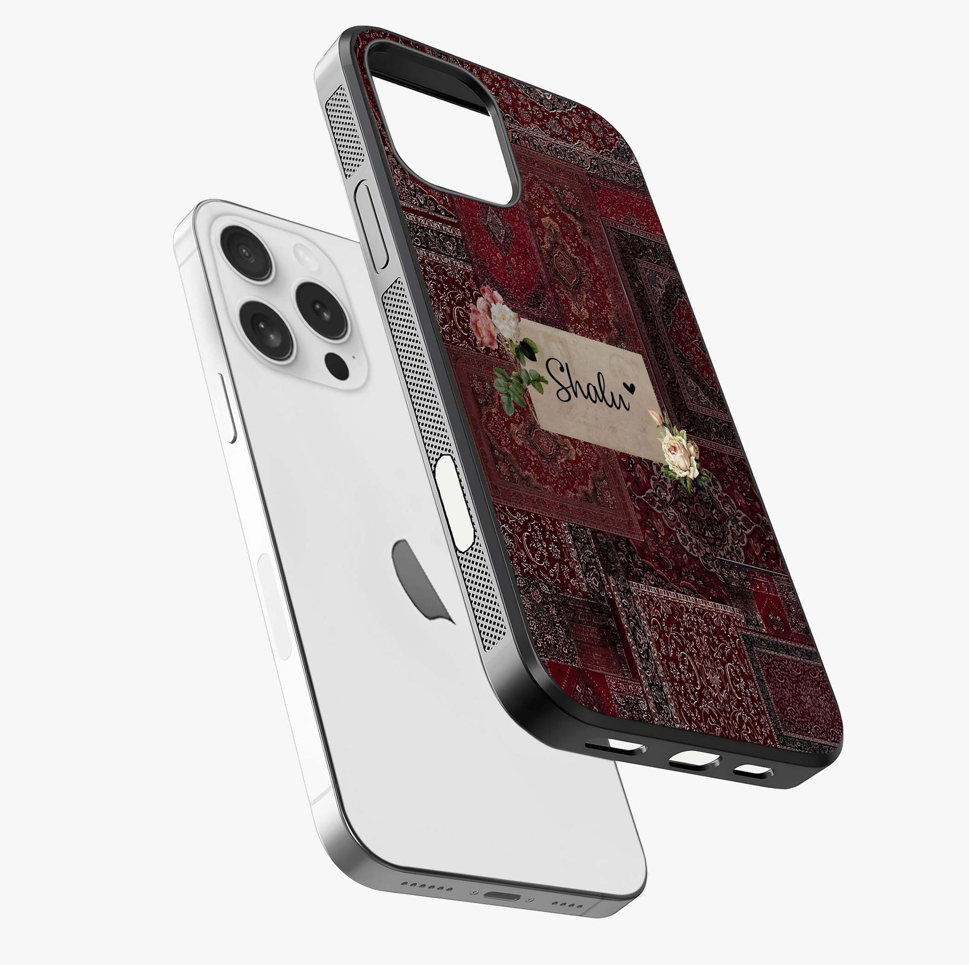 Velvet Wine Pattern Custom Name Glass Case laid diagonally highlighting side profile, edges and glossy glass shine.
