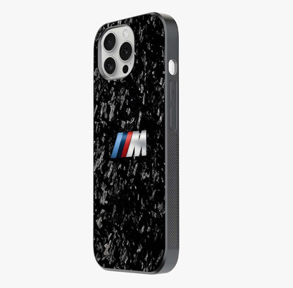 Carbon Speed Mark Glass Case photographed in natural light showing reflective finish and design depth.
