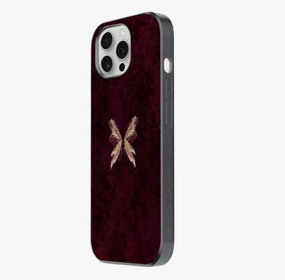 Crimson Fade Butterfly Glass Case photographed in natural light showing reflective finish and design depth.