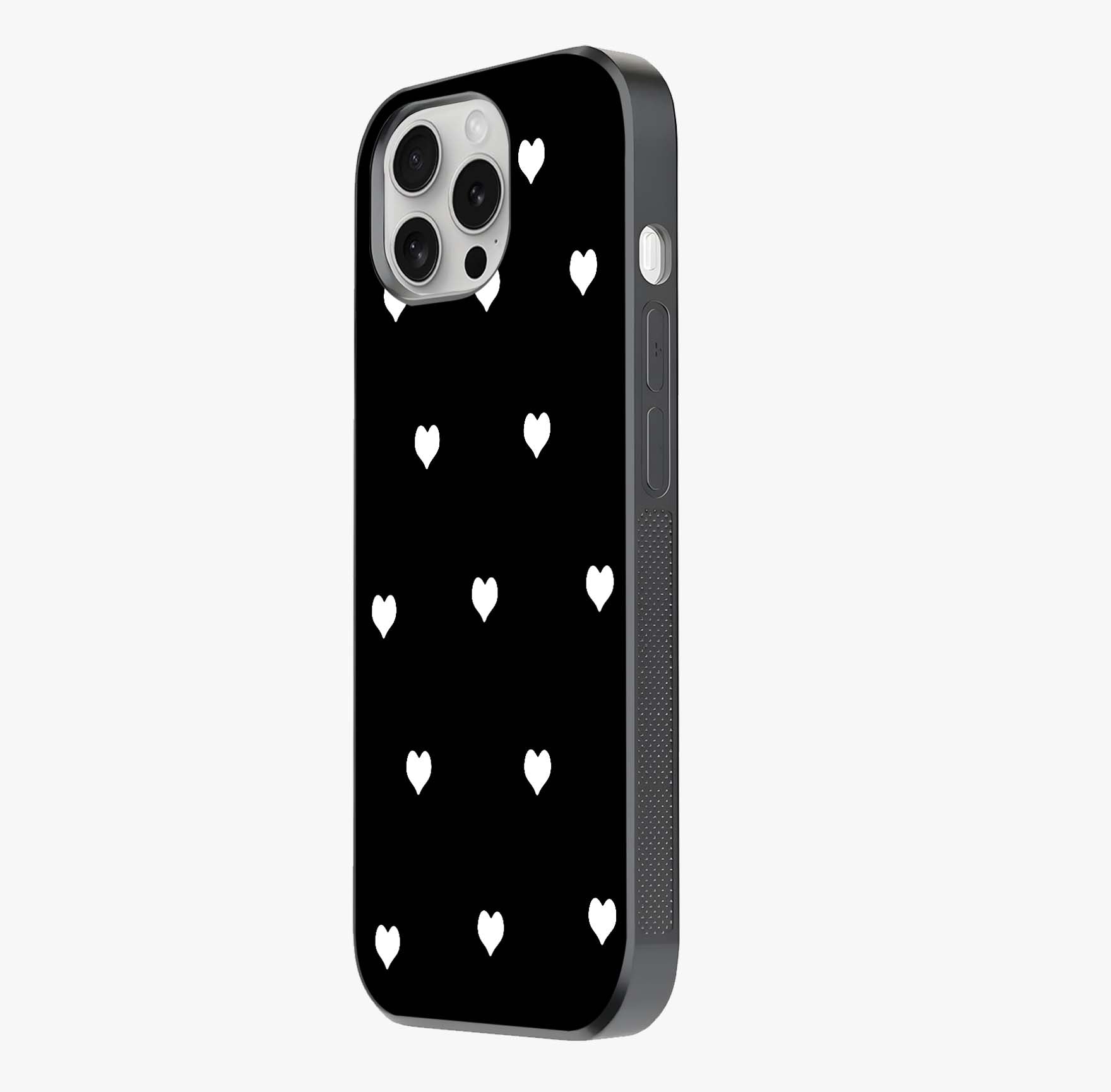 Cute And Simple White Hearts Glass Case photographed in natural light showing reflective finish and design depth.
