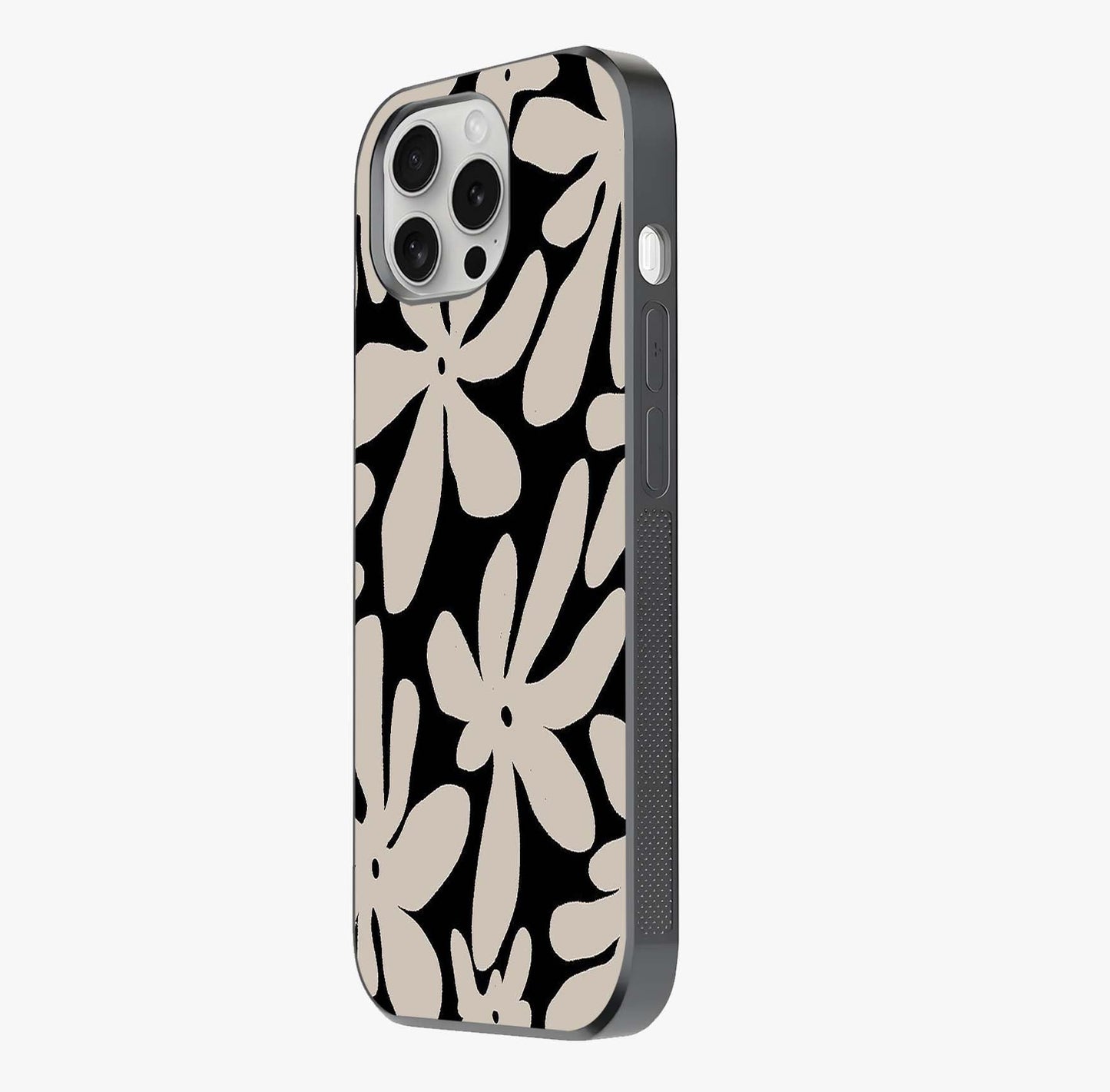 Monochrome Petal Dance Glass Case photographed in natural light showing reflective finish and design depth.
