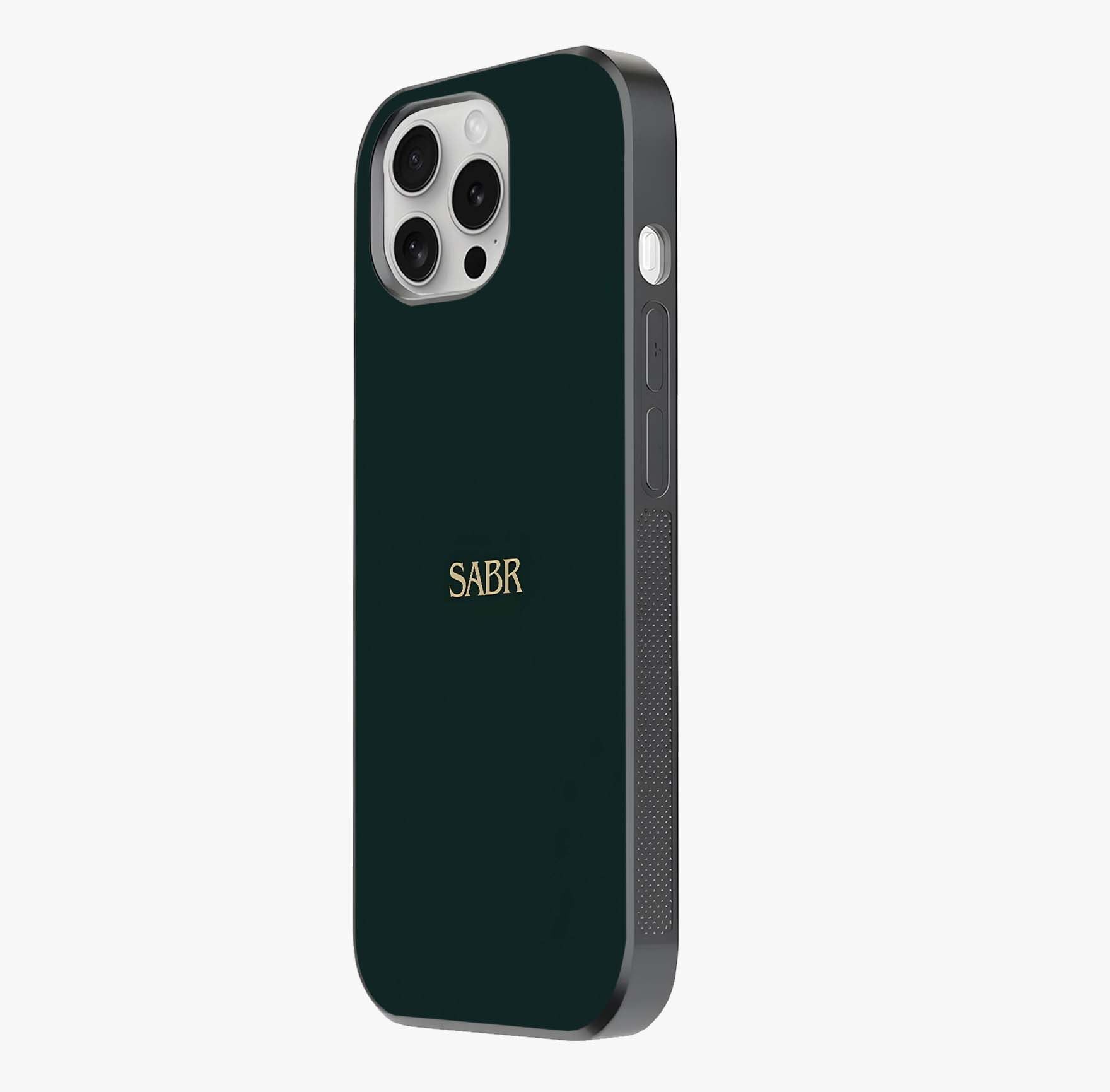 Sabr Minimal Patience Glass Case photographed in natural light showing reflective finish and design depth.