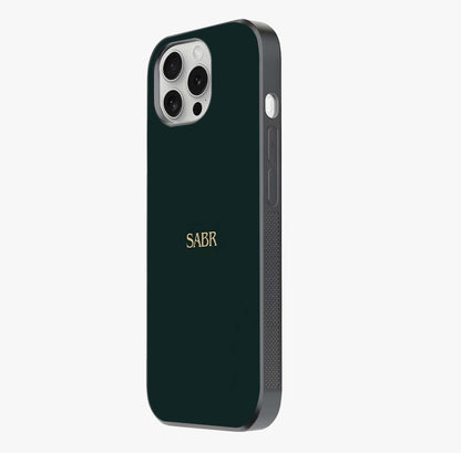 Sabr Minimal Patience Glass Case photographed in natural light showing reflective finish and design depth.