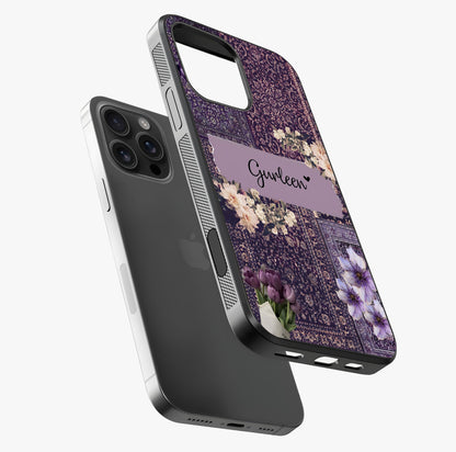 Antique Floral Whisper Custom Name Glass Case laid diagonally highlighting side profile, edges and glossy glass shine.