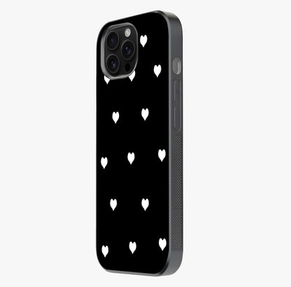 Cute And Simple White Hearts Glass Case photographed in natural light showing reflective finish and design depth.