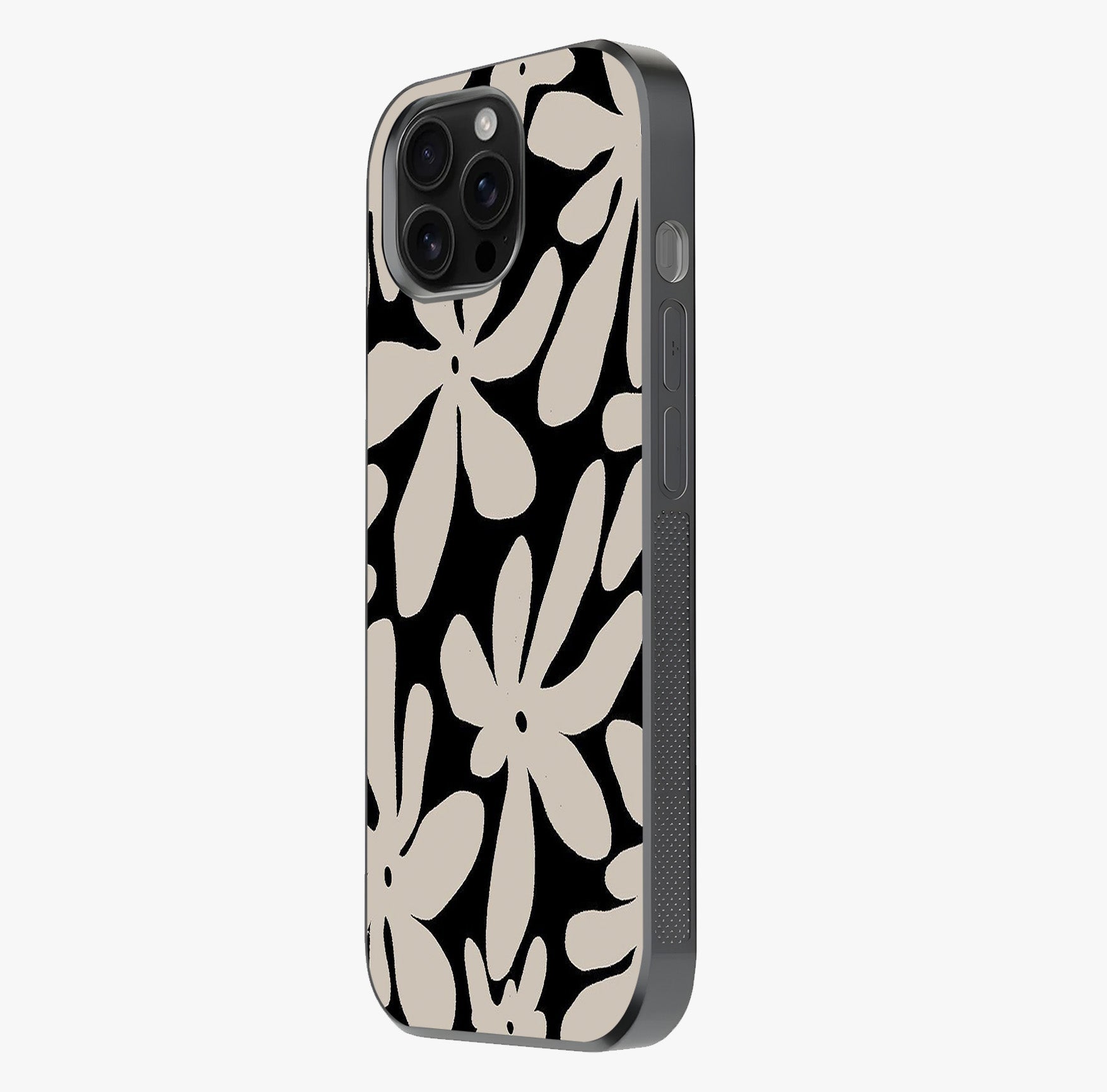 Monochrome Petal Dance Glass Case photographed in natural light showing reflective finish and design depth.