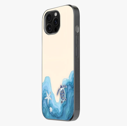 Ocean Drift Turtle Glass Case photographed in natural light showing reflective finish and design depth.