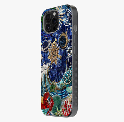 Universe Underwater Spark Glass Case photographed in natural light showing reflective finish and design depth.