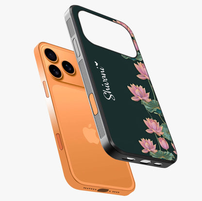 Lotus Bloom Serenity Custom Name Glass Case laid diagonally highlighting side profile, edges and glossy glass shine.