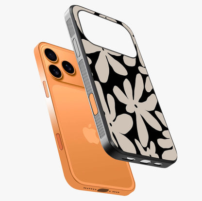 Monochrome Petal Dance Glass Case laid diagonally highlighting side profile, edges and glossy glass shine.