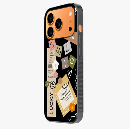 Lucky Aesthetic Collage Glass Case photographed in natural light showing reflective finish and design depth.