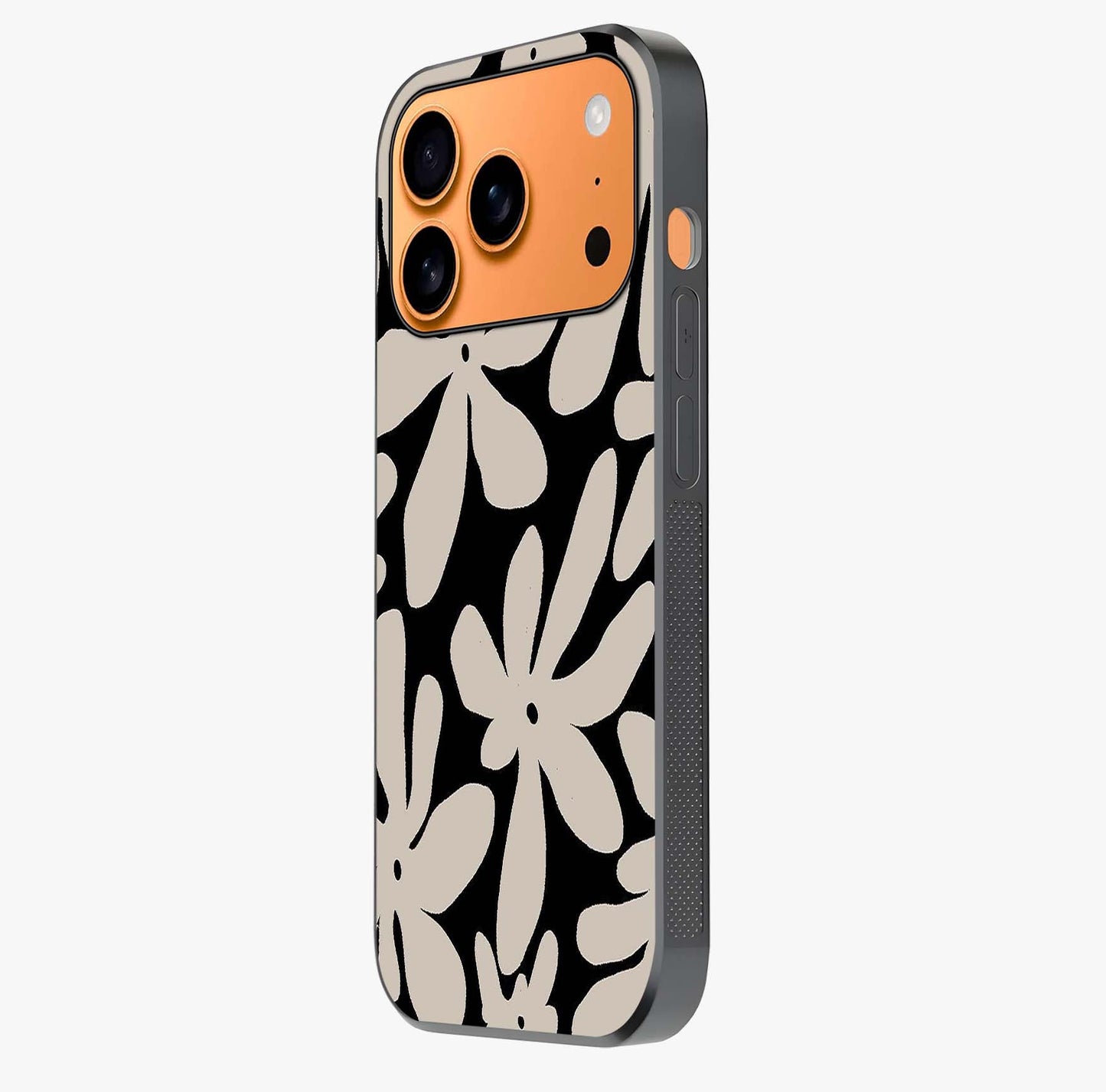Monochrome Petal Dance Glass Case photographed in natural light showing reflective finish and design depth.