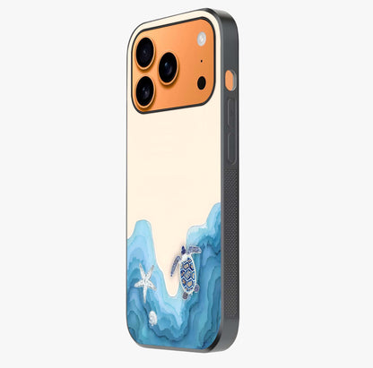 Ocean Drift Turtle Glass Case photographed in natural light showing reflective finish and design depth.