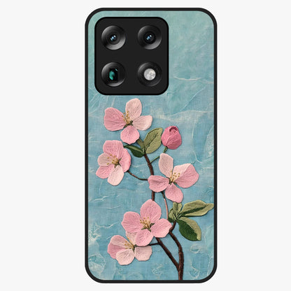 Threaded Blossom Breeze Glass Case showing flat back view with delicate blossom artwork and glossy glass finish.