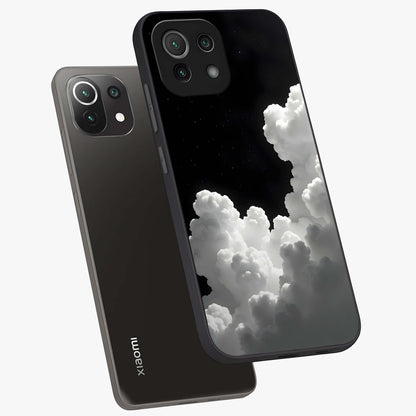 Black Background With White Cloud Glass Case displayed in angled mockup highlighting soft white cloud illustration and minimal design.