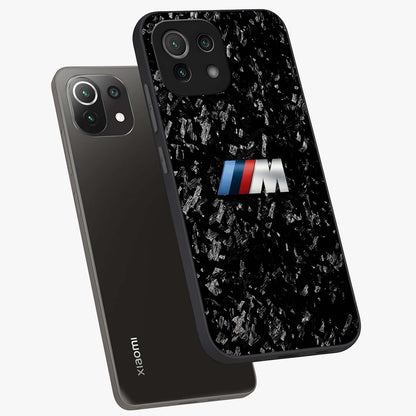 Carbon Speed Mark Glass Case displayed in angled mockup highlighting racing inspired carbon design and sleek aesthetic style.