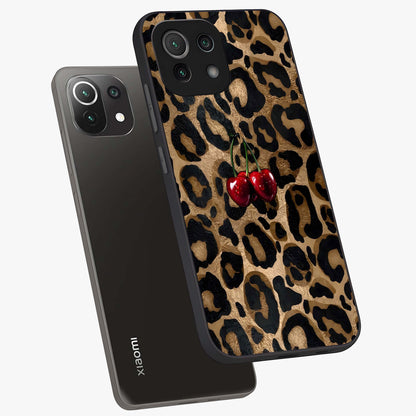 Leopard Wild Cherry Glass Case displayed in angled mockup highlighting bold animal print design with playful cherry aesthetic.