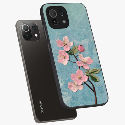 Threaded Blossom Breeze Glass Case displayed in angled mockup highlighting elegant floral design with soft aesthetic style.