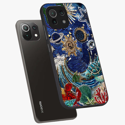 Universe Underwater Spark Glass Case displayed in angled mockup highlighting glowing aquatic design with celestial aesthetic.