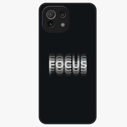 Focus Mode On Glass Case showing flat back view with bold motivational typography design and glossy glass finish.