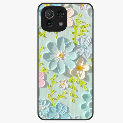 Frosted Petal Garden Glass Case showing flat back view with soft frosted floral artwork and glossy glass finish.