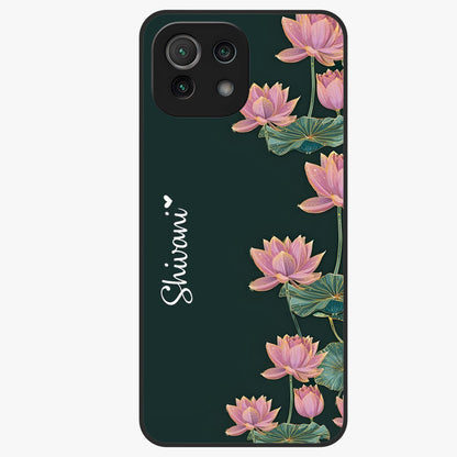 Lotus Bloom Serenity Custom Name Glass Case showing flat back view with elegant lotus flower artwork and personalized name design.