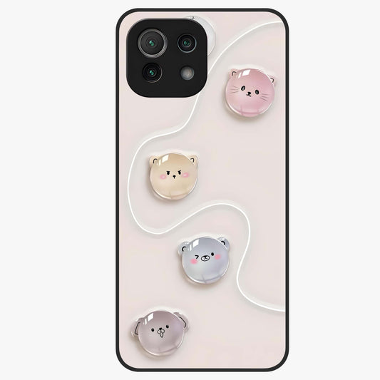 Puffy Face Parade Glass Case showing flat back view with cute puffy character faces artwork and glossy glass finish.