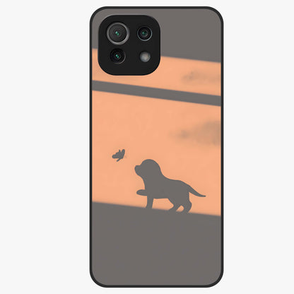 Puppy Shadow Art Glass Case showing flat back view with cute puppy shadow style artwork and glossy glass finish.