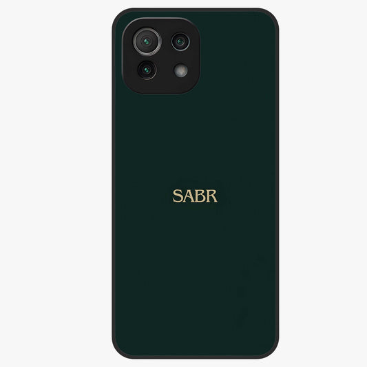 Sabr Minimal Patience Glass Case showing flat back view with minimalist typography artwork and glossy glass finish.