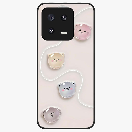 Puffy Face Parade Glass Case showing flat back view with cute puffy character faces artwork and glossy glass finish.