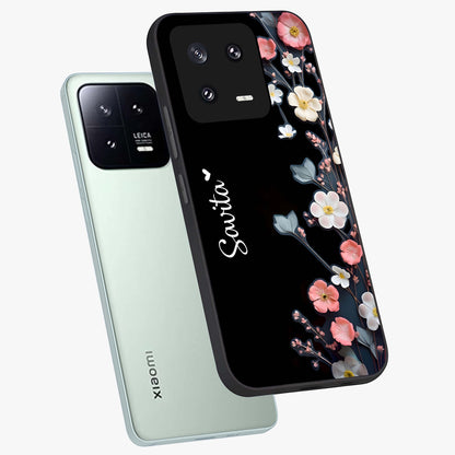 Black Elegance Floral Custom Name Glass Case displayed in angled mockup highlighting dark floral aesthetic and custom name feature.
