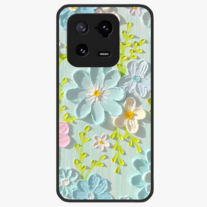 Frosted Petal Garden Glass Case showing flat back view with soft frosted floral artwork and glossy glass finish.