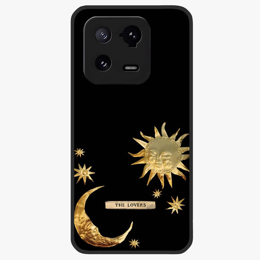 Golden Celestial Charm Glass Case showing flat back view with golden celestial charm artwork and glossy glass finish.