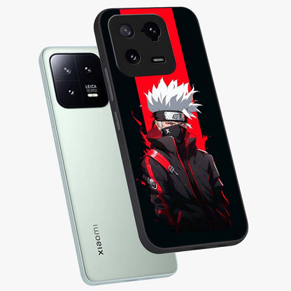 Kakashi Scarlet Shadow Glass Case displayed in angled mockup highlighting dramatic ninja illustration with scarlet themed aesthetic.