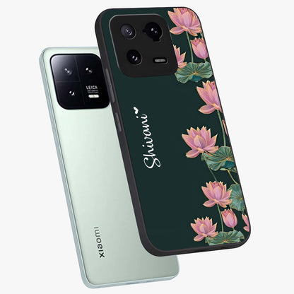 Lotus Bloom Serenity Custom Name Glass Case displayed in angled mockup highlighting graceful lotus illustration with custom name feature.