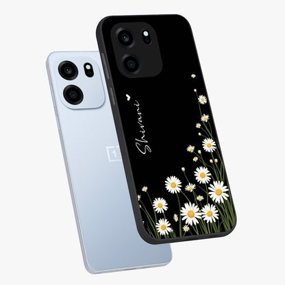 Daisy Cascade Custom Name Glass Case displayed in angled mockup highlighting delicate daisy artwork with custom name feature.