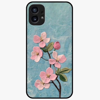 Threaded Blossom Breeze Glass Case showing flat back view with delicate blossom artwork and glossy glass finish.