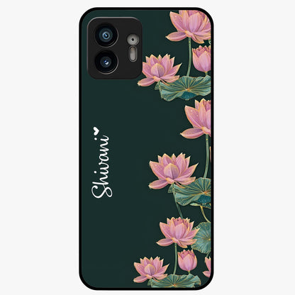 Lotus Bloom Serenity Custom Name Glass Case showing flat back view with elegant lotus flower artwork and personalized name design.
