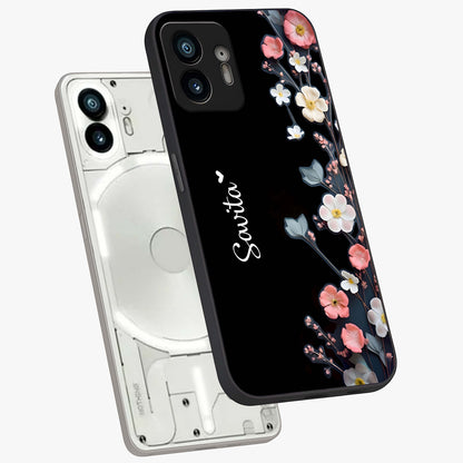 Black Elegance Floral Custom Name Glass Case displayed in angled mockup highlighting dark floral aesthetic and custom name feature.