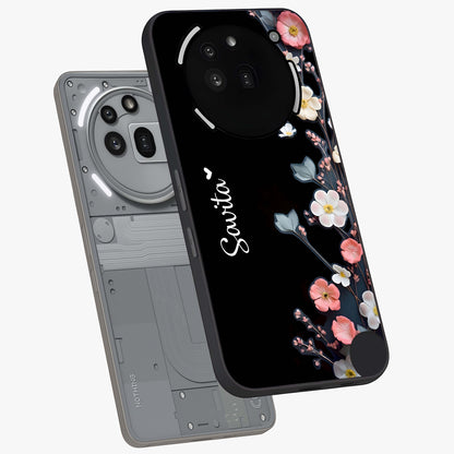 Black Elegance Floral Custom Name Glass Case displayed in angled mockup highlighting dark floral aesthetic and custom name feature.