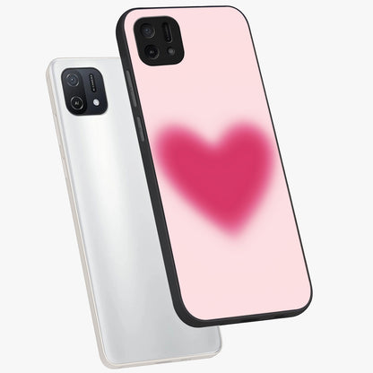 Pink Aura Heart Glass Case displayed in angled mockup highlighting vibrant pink heart design with dreamy aura aesthetic.