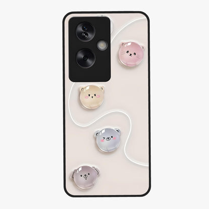 Puffy Face Parade Glass Case showing flat back view with cute puffy character faces artwork and glossy glass finish.