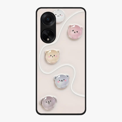 Puffy Face Parade Glass Case showing flat back view with cute puffy character faces artwork and glossy glass finish.