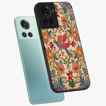 Tropical Folk Art Bird Glass Case for 1+10R angled mockup showcasing glossy finish and rich cultural tones