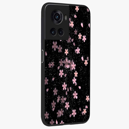 Pink Flower Black Background Glass Case for 1+10R side perspective highlighting vivid bloom textures and sleek build